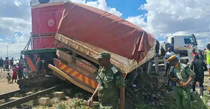 Devastating Collision: Goods Train and Truck Wreckage