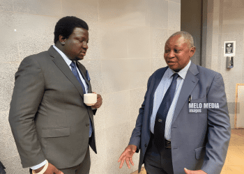 Nalolo MP Hon. Imanga Wamunyima Confers with Former Bank of Zambia Governor Dr. Caleb Fundanga During PAC Session