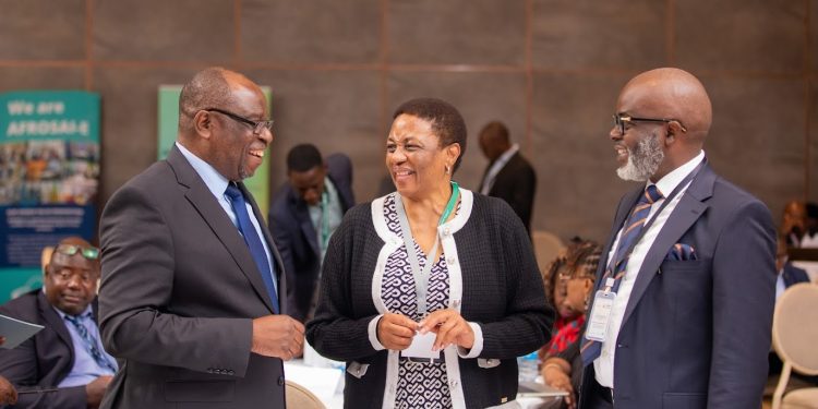 Acting Auditor General Shares Light Moment with PAC Chairperson and AFROSAI-E CEO at Key Governance Workshop